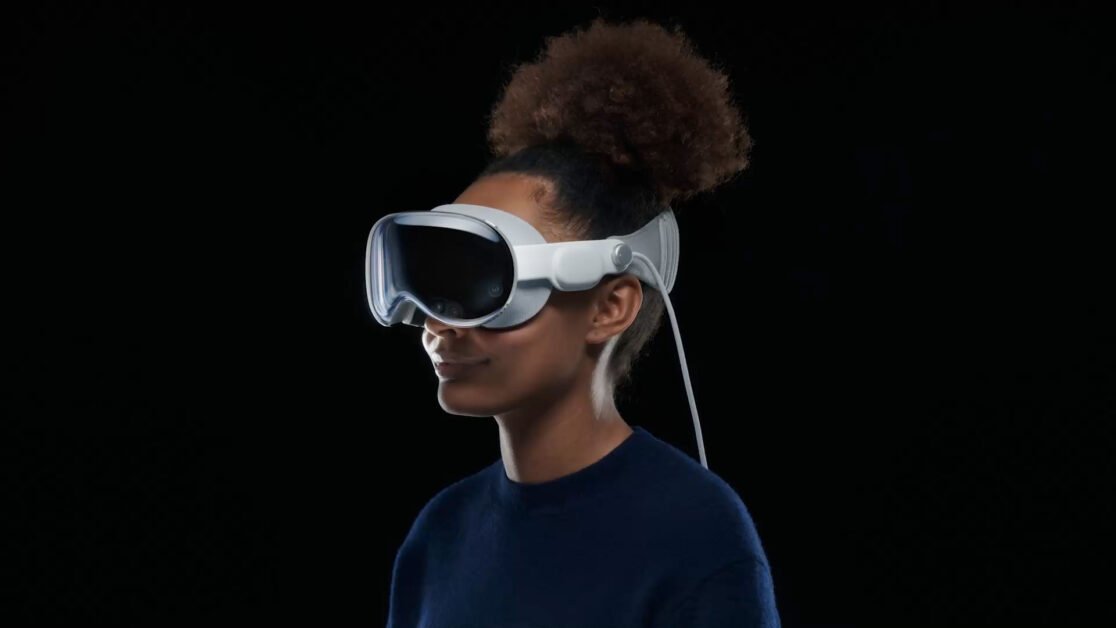 Woman wearing Apple Vision Pro equipment